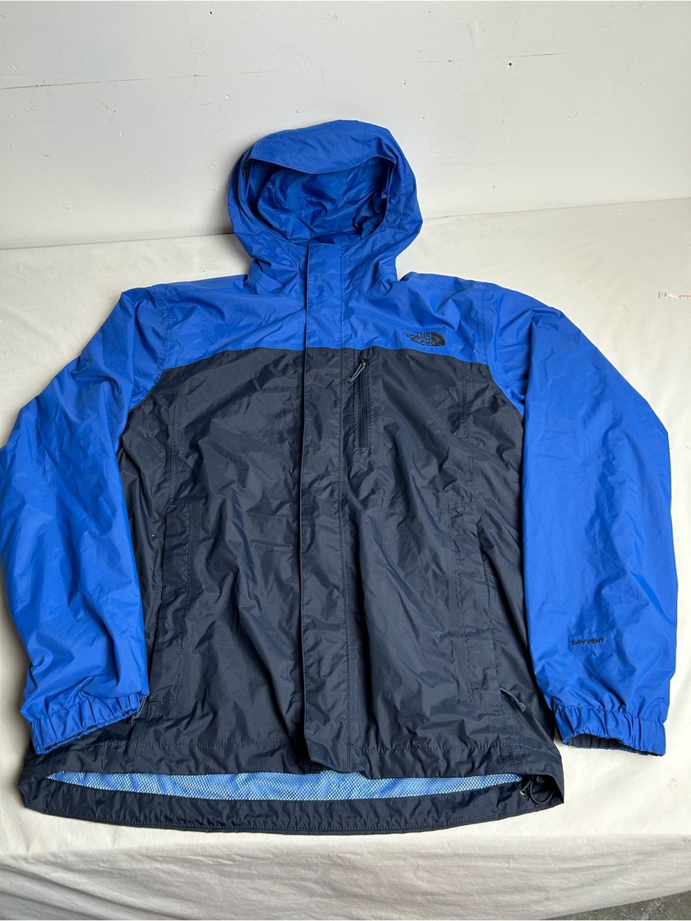 The North Face Men’s Blue/Black Waterproof Hooded Jacket size small